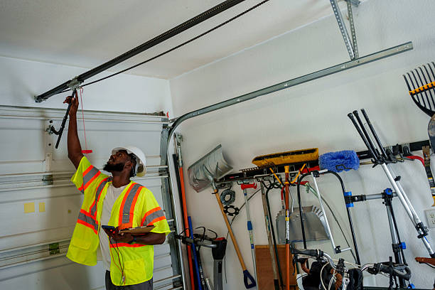 Professional Garage Door technician working in Monson Center, MA